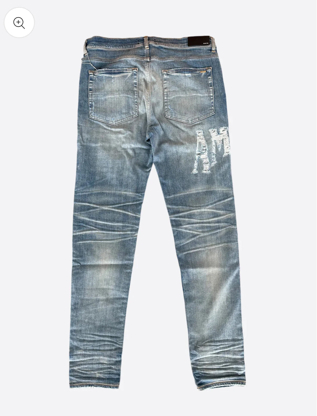 AMIRI DISTRESSED JEANS